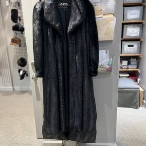 Black Mink Fur Coat size 18. Coat is in storage at the Fur company.